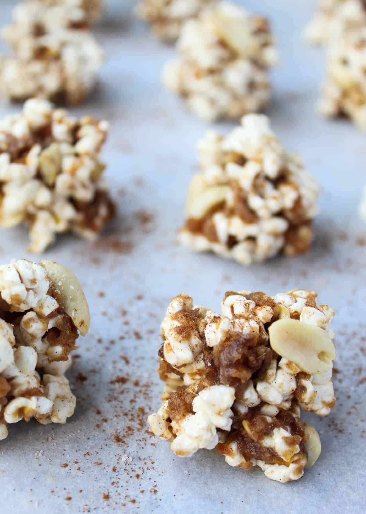 No bake and 30 minutes to make, these Peanut Butter Caramel Popcorn Balls are the perfect holiday snack. No added sweetener, vegan, and gluten free! - Eat the Gains