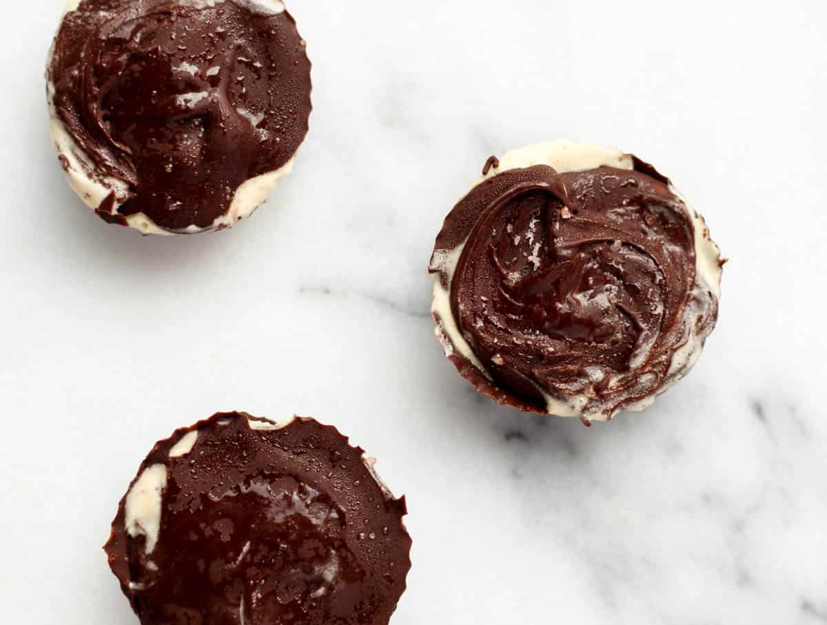 These two ingredient Vegan Salted Caramel Ice Cream Cups make an easy, dairy free, and gluten free frozen dessert perfect for entertaining or a sweet treat - Eat the Gains