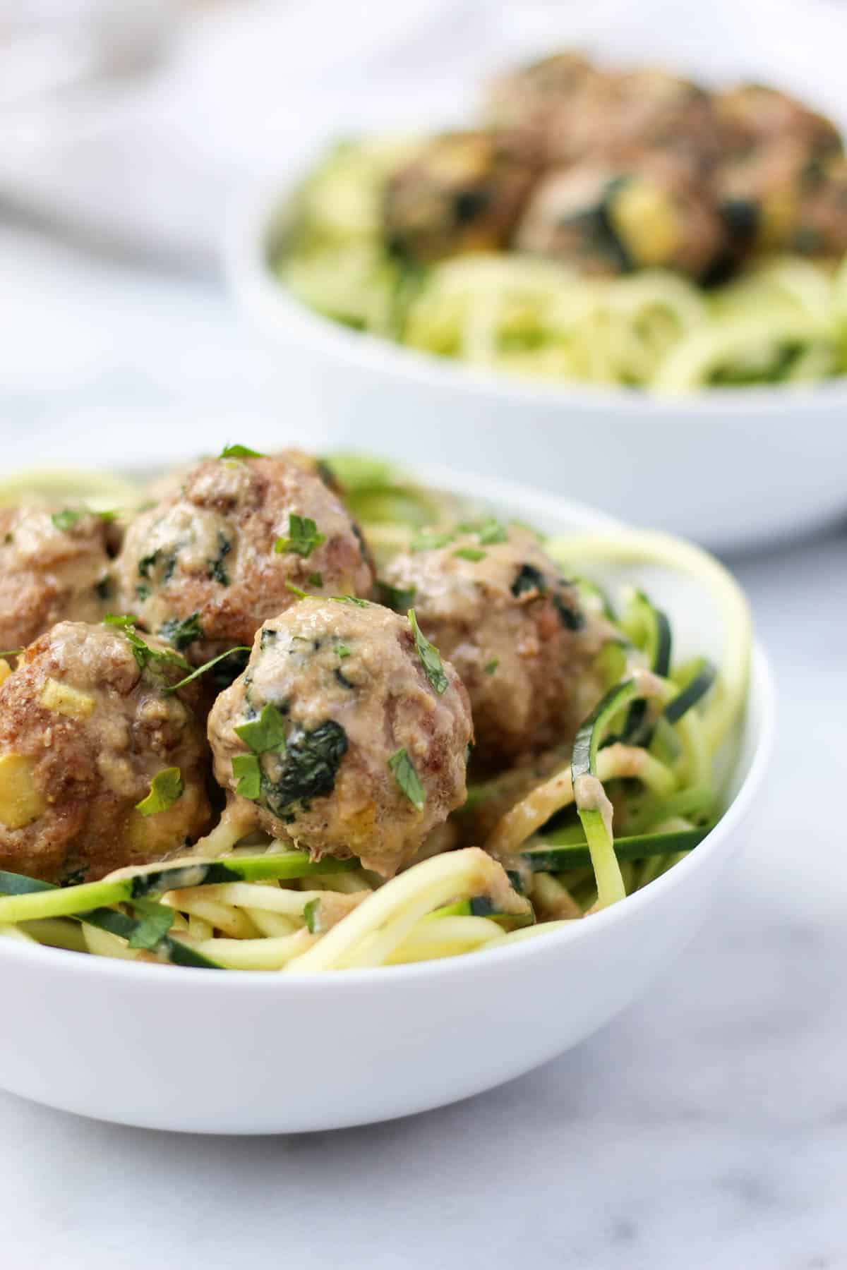 Protein, veggies, and fruit packed, these Turkey, Kale, & Apple Meatballs come together in less than 30 minutes and are paleo, gluten free, and Whole30 compliant! - Eat the Gains