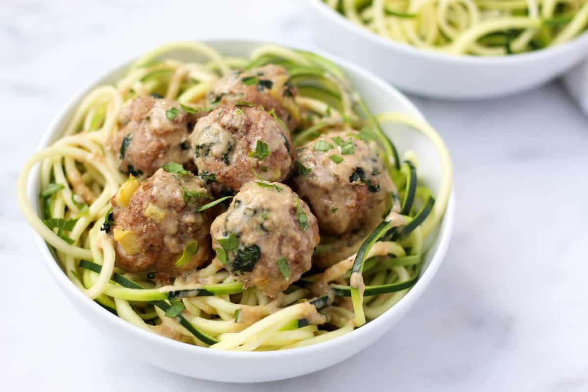 Protein, veggies, and fruit packed, these Turkey, Kale, & Apple Meatballs come together in less than 30 minutes and are paleo, gluten free, and Whole30 compliant! - Eat the Gains