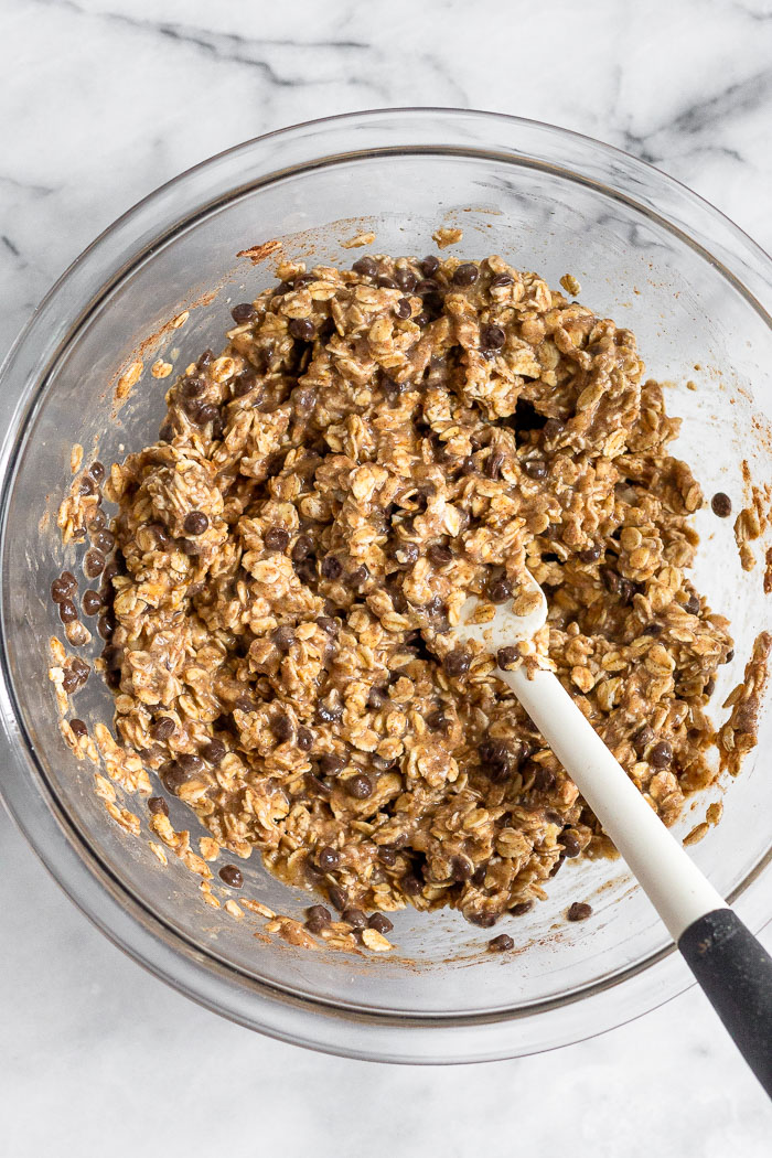 Bowl with the batter for healthy chocolate chip oatmeal muffins.
