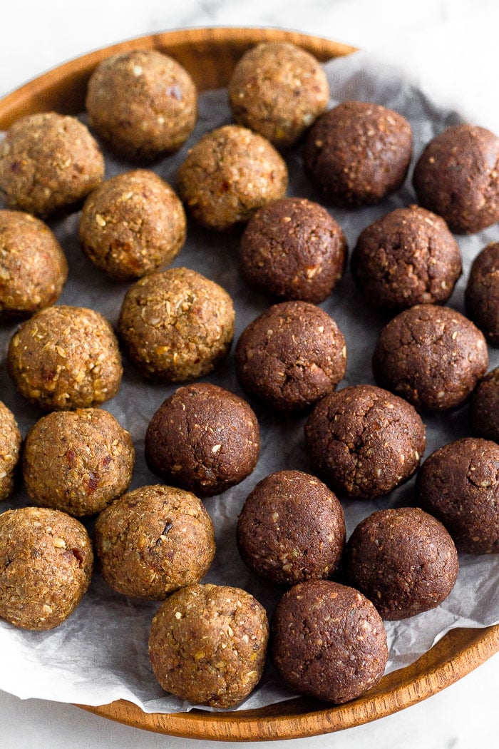 Close up of a plate with two flavors of seed cycling balls on it.